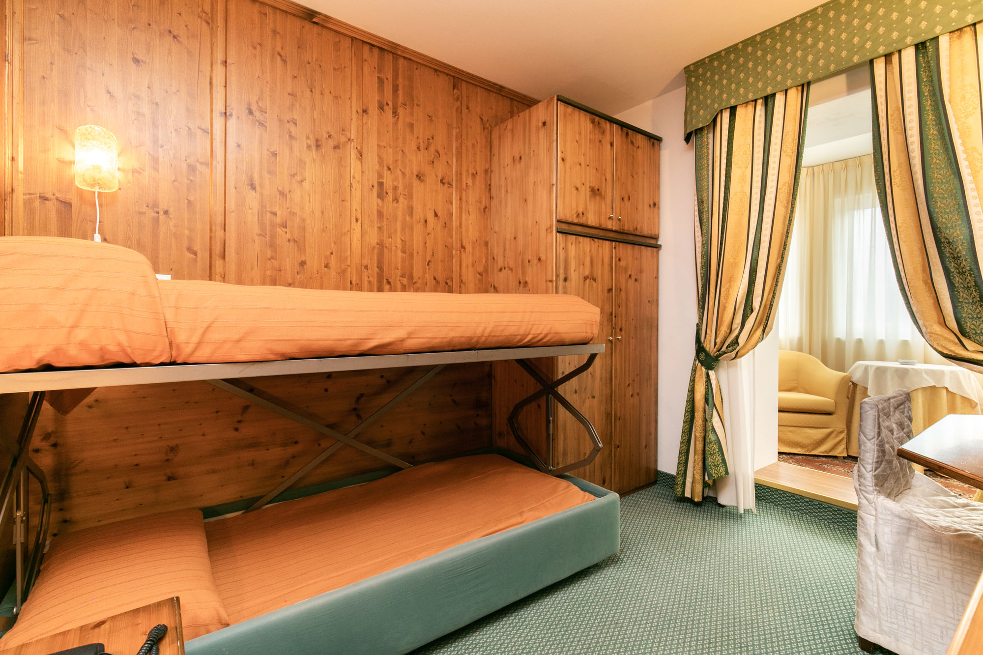 Camera Family Room per 3 persone di Grand Hotel des Alpes in centro a San Martino di Castrozza